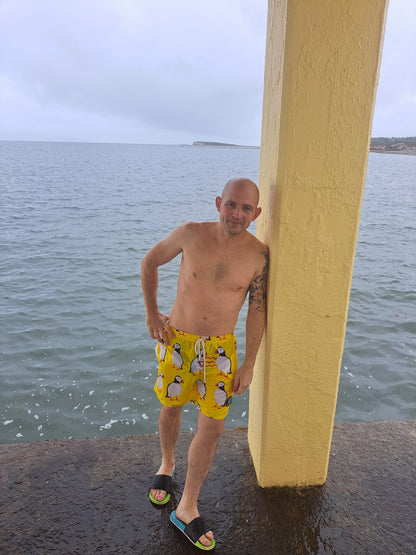 Mens vibrant yellow puffin swim shorts